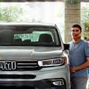 Adam C. with his family car at the wash