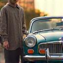 Liam O. next to his classic car