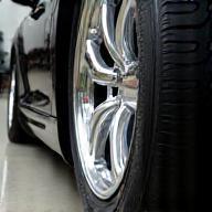 Close-up of shiny detailed alloy wheel